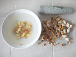 crack the ginkgo nuts, soak the nuts in water