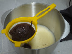 sieve the cocoa mixture into the beaten eggs and mix well